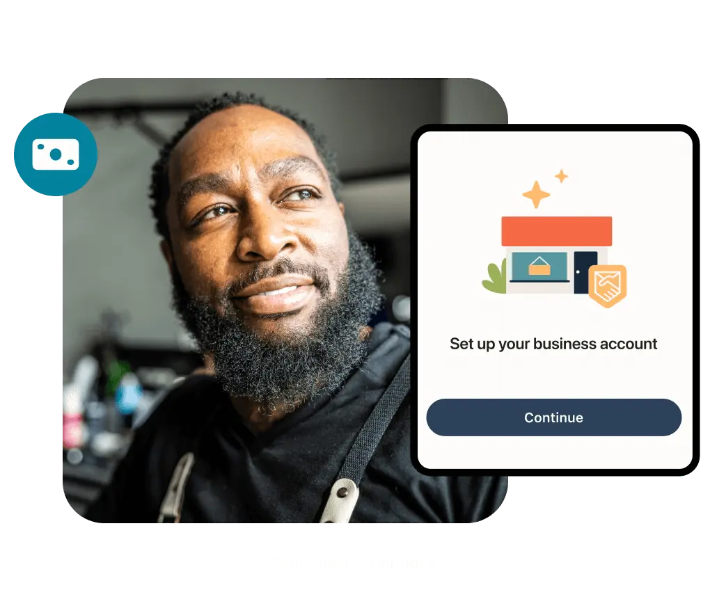 Man smiling with a screen prompt to set up a business account.