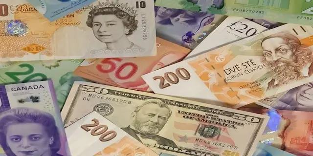 A collection of international banknotes.