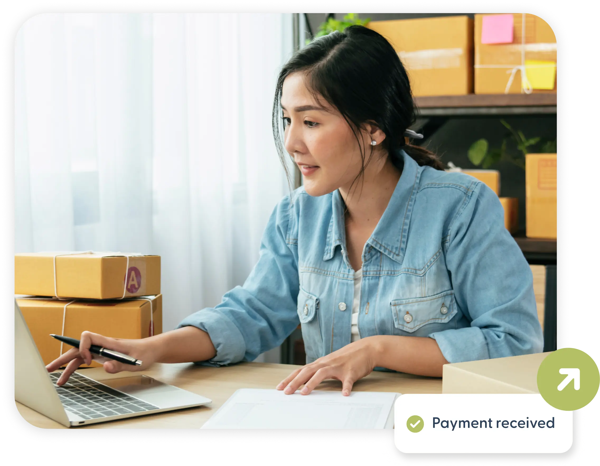 A woman recording a video of herself.